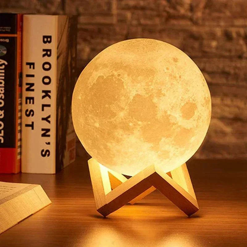 Cosmic Moon LED book light with wooden stand glowing warm light for bedroom decoration and child gift