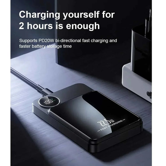 Massive 5000mAh wireless fast charging power bank with USB-C, 23W max output, digital display, and built-in cables.