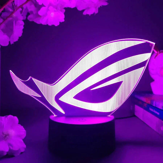 ROG 3D LED Lamp with black base glowing purple, gaming logo light with 7 color mode, decorative night light for gaming setup.