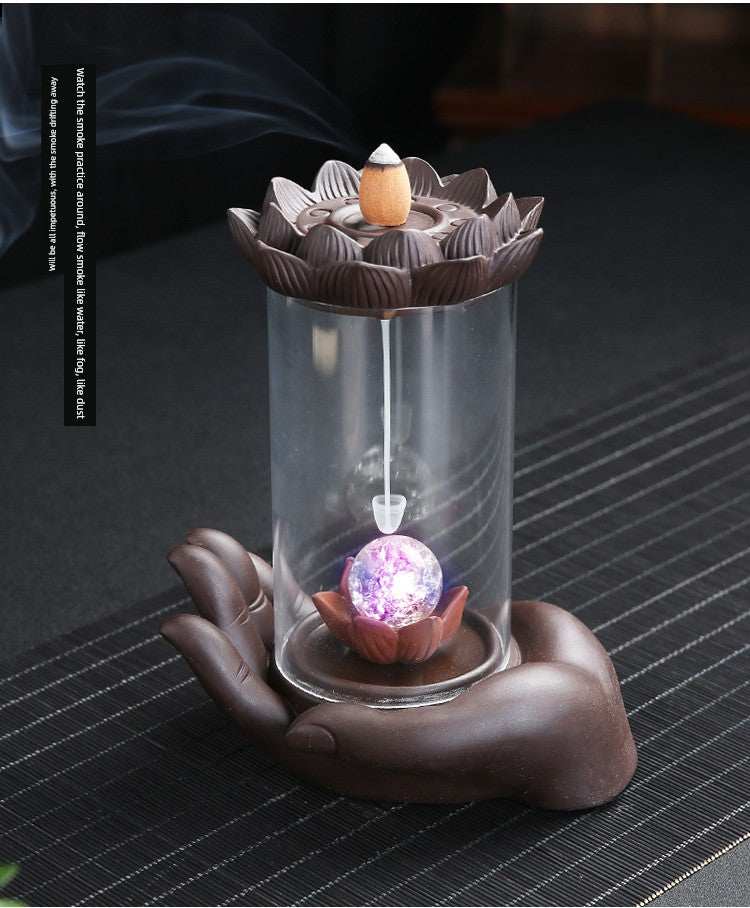 Backflow purple sand incense burner with glass cylinder, lotus design, and hand-shaped base