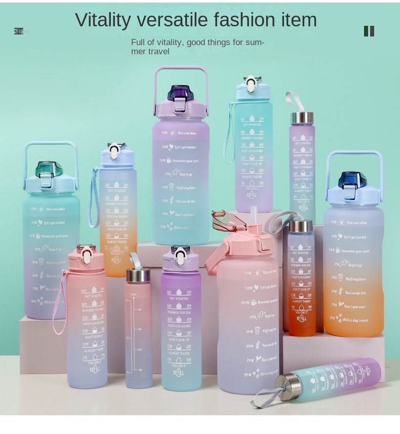 Colorful reusable sports water bottles with motivational quotes and time markers, featuring leakproof lids and straw options, made of BPA-free plastic.