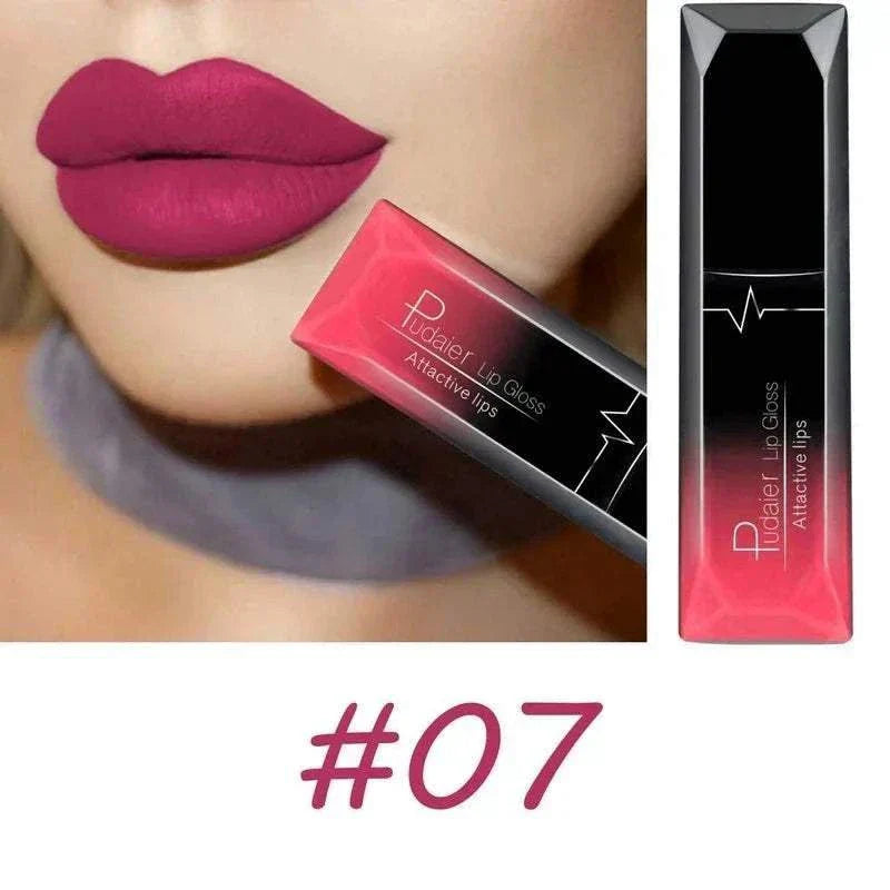 Close-up of lips wearing matte pink lipstick with a matching pink and black lip gloss tube labeled "Pudaier Lip Gloss Attractive lips" and the number 07 displayed below.