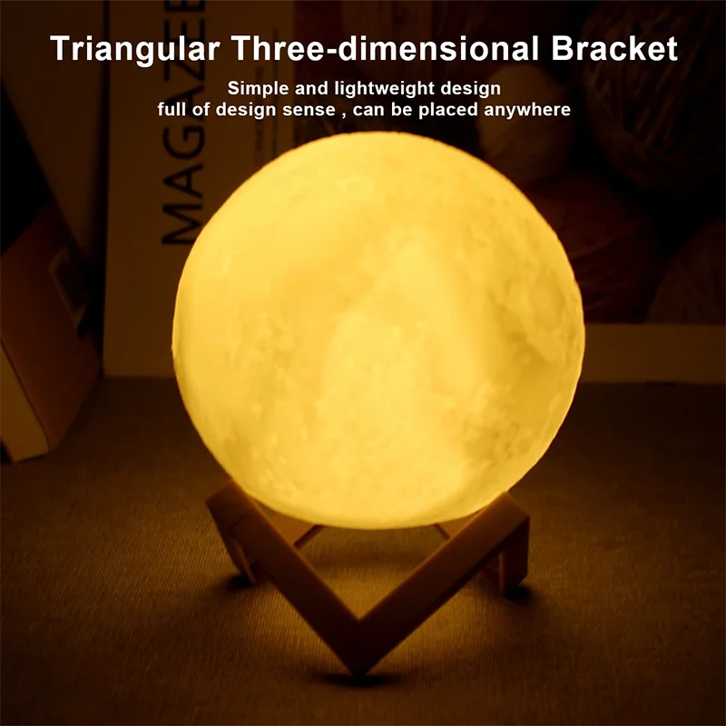 Cosmic Moon LED book light with triangular stand emitting warm light for bedroom decoration and gift.