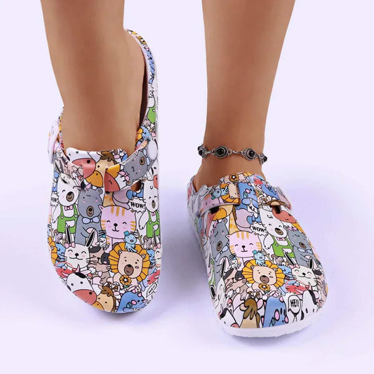 Women's croc style slip-ons with colorful cute animal print and flat heel