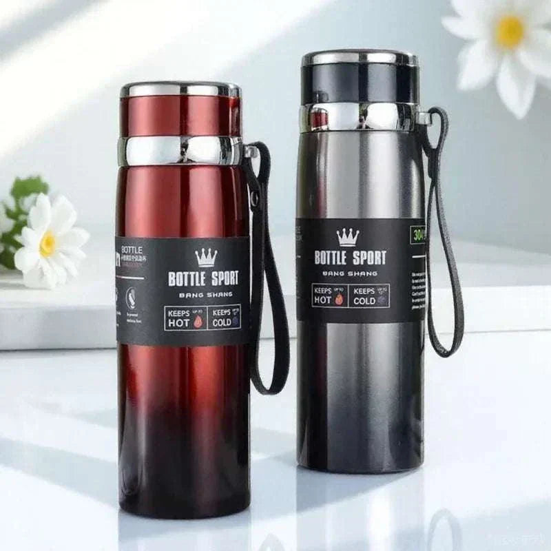 High-quality 1L stainless steel thermal water bottles in red and black, keeps beverages hot and cold for 6-12 hours.
