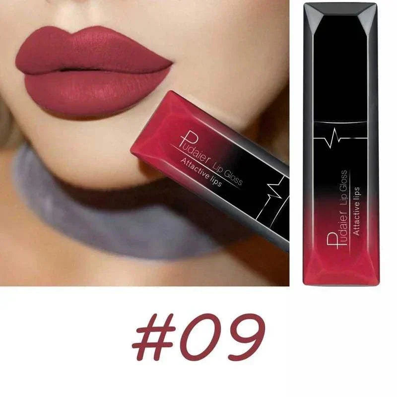 Close-up of lips wearing matte dark red lipstick shade #09 from TOP-RATED TikTokMadeMeBuyIt Lip Stick collection with matching lip gloss tube.