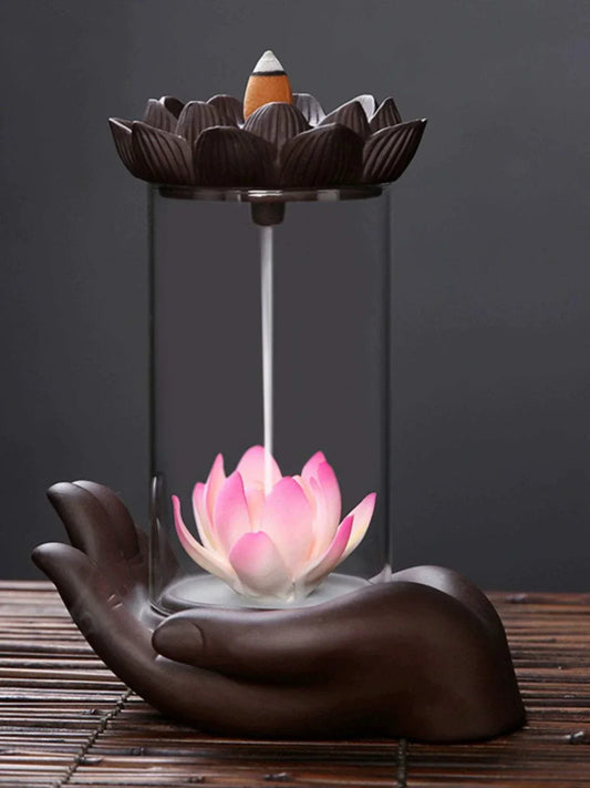 Backflow purple sand incense burner with lotus flower and hand-shaped base in zen style