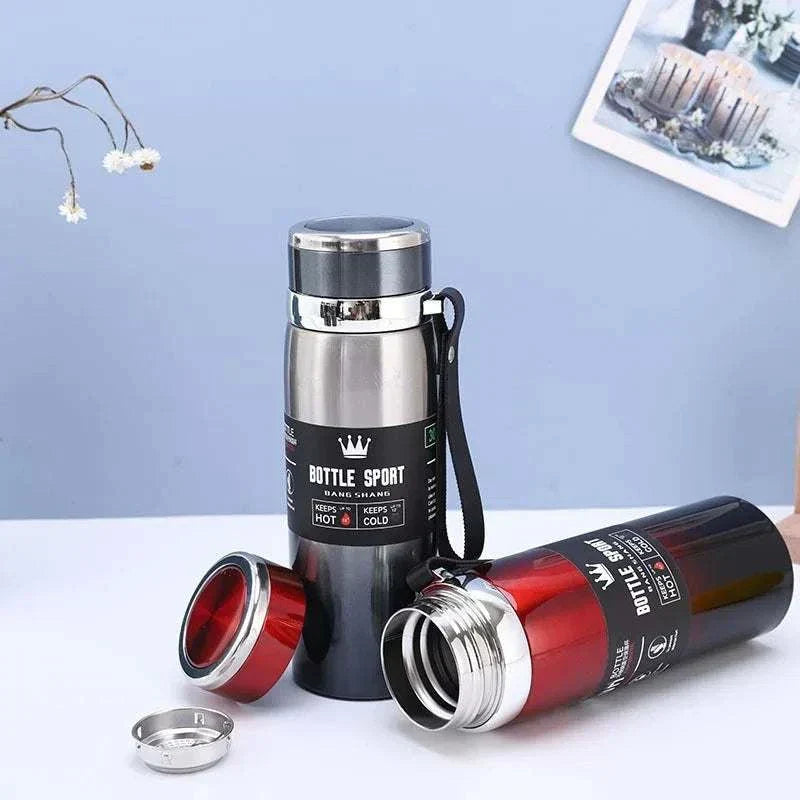 Stainless steel 1L thermal water bottle in black and red, keeps drinks hot or cold, with vacuum insulation and sport design