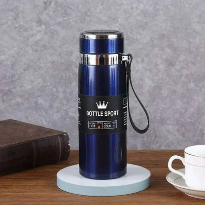Blue stainless steel thermal water bottle with black label and strap, keeps drinks hot and cold for 6-12 hours, 1-liter capacity.