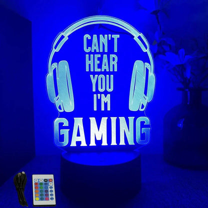 Very bright neon gaming sign with LED lights displaying "Can't Hear You I'm Gaming" and colorful remote control on wooden base