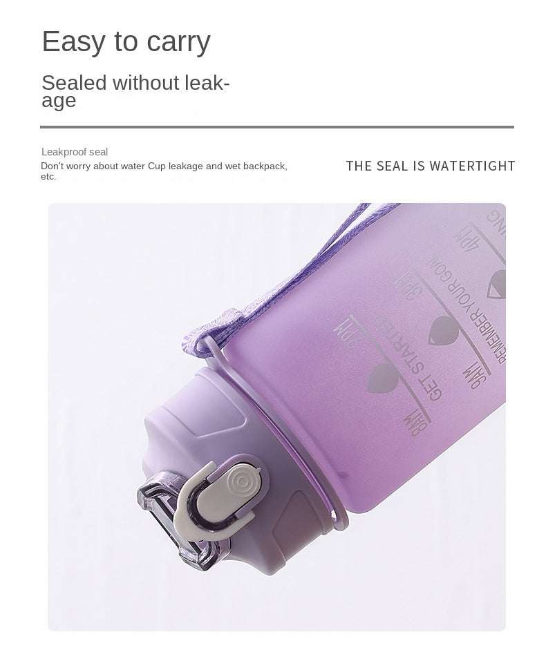 Purple sports water bottle with motivational quotes and time marker, leakproof and easy to carry.