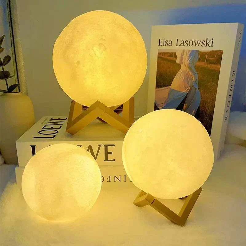 Cosmic Moon LED book lights with stands emitting warm light, perfect for child bedroom decoration or birthday gift.