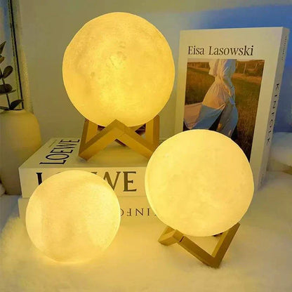 Cosmic Moon LED book lights with stands emitting warm light, perfect for child bedroom decoration or birthday gift.