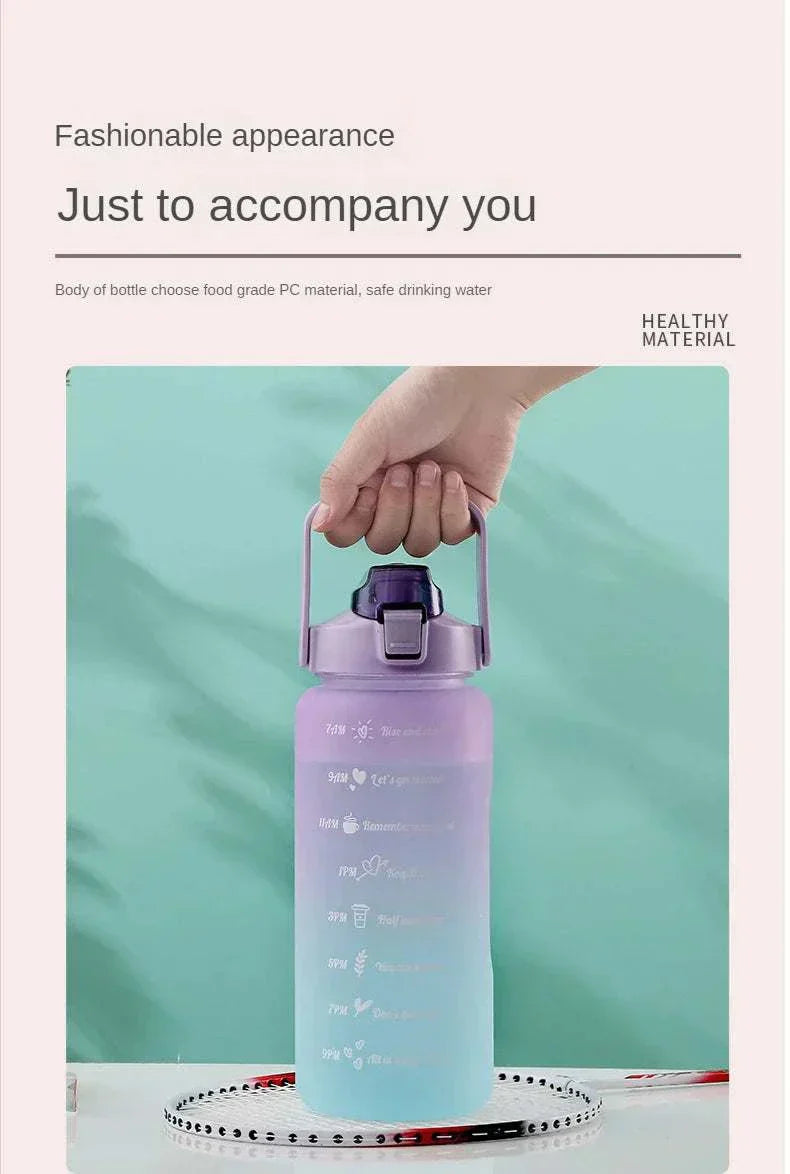Reusable purple sports water bottle with motivational quotes and time markers, plastic eco-friendly design with straw and leakproof lid