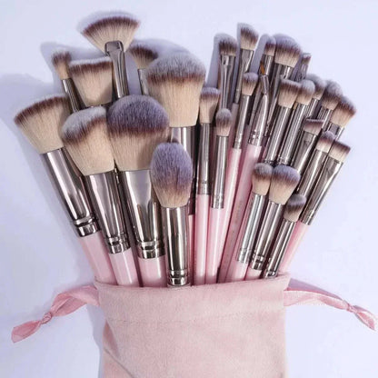 MAANGE 30pcs professional makeup brush set with pink handles and soft nylon bristles, displayed with a pink drawstring bag.