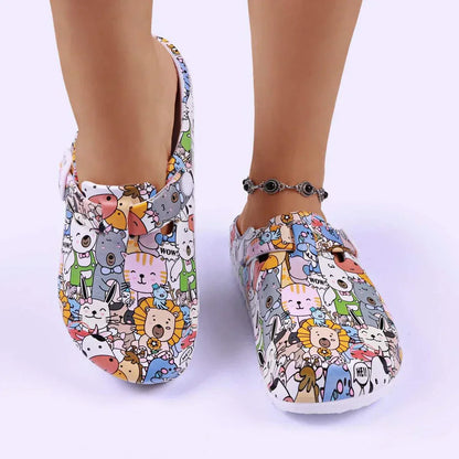 Women's croc style slip-ons with colorful cute animal print and flat heel