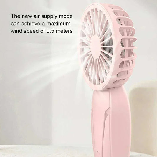 Cute portable handheld fan in pink with USB rechargeable battery and three-speed wind power settings for on-the-go cooling.