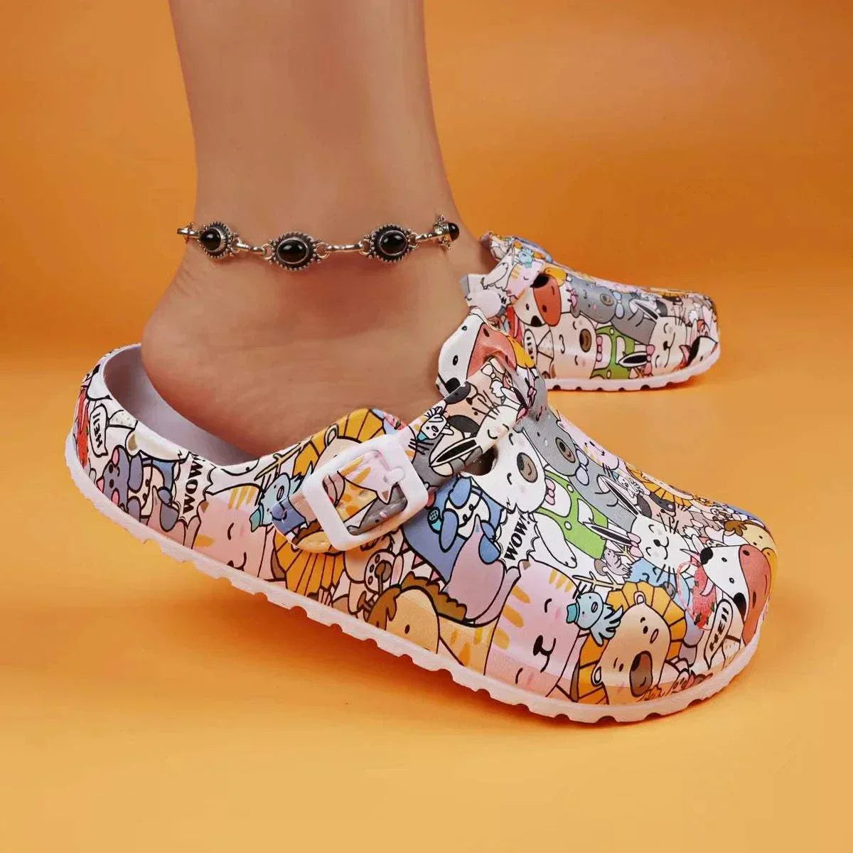 Super cute croc style slip-ons with colorful animal print pattern for women, flat heel slippers perfect for spring and autumn.